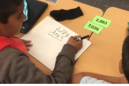 Mrs. McIver uses the workshop to provide individualized instruction to her students. This week during a workshop she was able to meet with almost half her class in small groups to tackle a common error students were making in subtraction.
