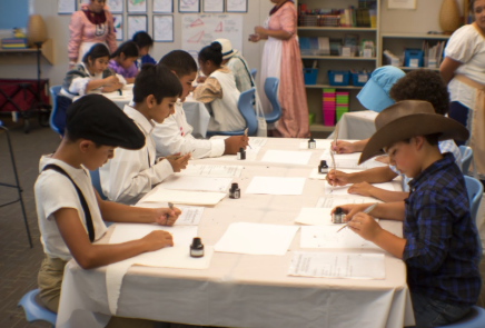 Our fourth graders went back in time on Tuesday to the pioneer days. They churned butter, hand-cranked ice cream, wrote with quill pens, practiced tin smithing, made corn-husk dolls, square danced, and so much more! Thank you to the volunteers and 4th grade teachers for making their learning come to life.