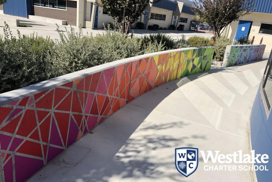 Our amazing art teachers collaborated to create two beautiful murals on campus, where every student painted a section! The next time you are on campus be sure to swing by the outdoor spaces of our art rooms and ask your student which shape and color they painted!