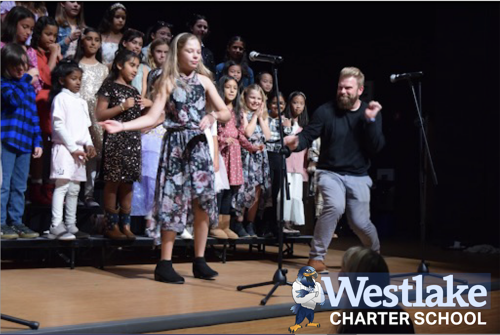 Not only did the WCS Glee Club rock the stage before we all sailed off to Thanksgiving Break, but at one point the amazing Mr.  Aichele was brought to the stage to share the spotlight with our Explorer Performers!