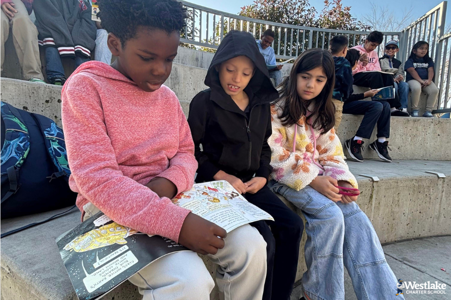 Reading time for Buddy Classes, Mr. Martin’s 5th grade class and Mrs. Dickson’s Kindergarten class, has become a favorite activity for both groups. The students love reading together, with the older Explorers mentoring their younger buddies and the Kindergartners building confidence as they share stories. This special time fosters teamwork, encourages kindness, and strengthens their classroom communities, creating lasting bonds and making learning more enjoyable for everyone involved.